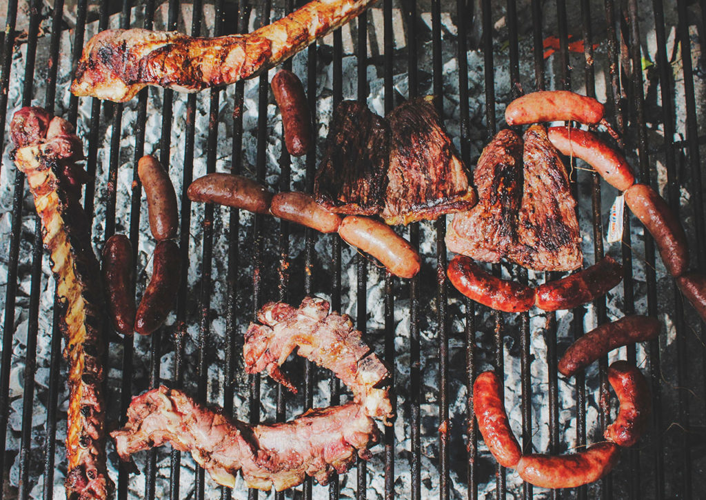 grilling meat basted with Georgia mustard