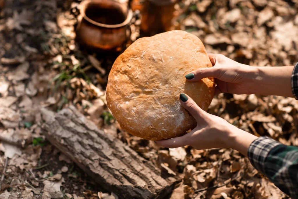 a loaf ouf sourdough bread at camp