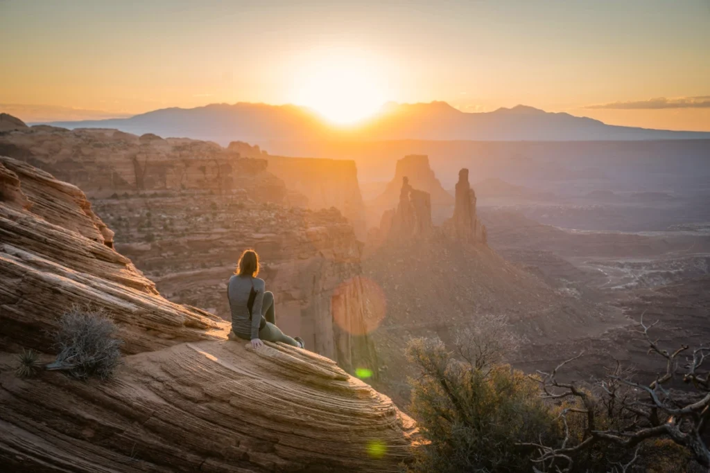 A hiker at sunset, symbolizing "What is a Core Moment?"