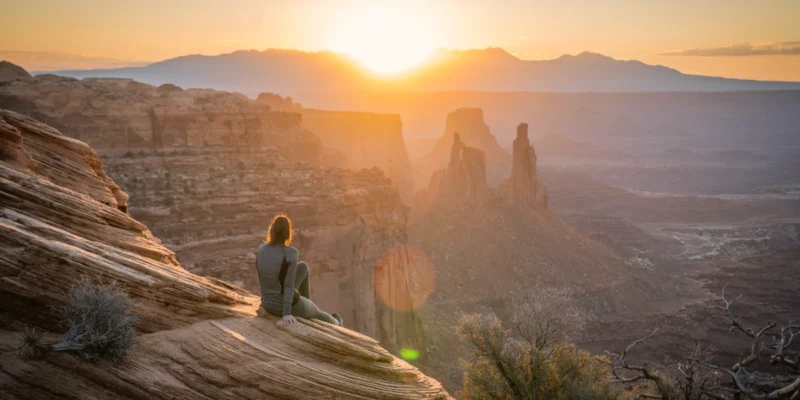 A hiker at sunset, symbolizing "What is a Core Moment?"