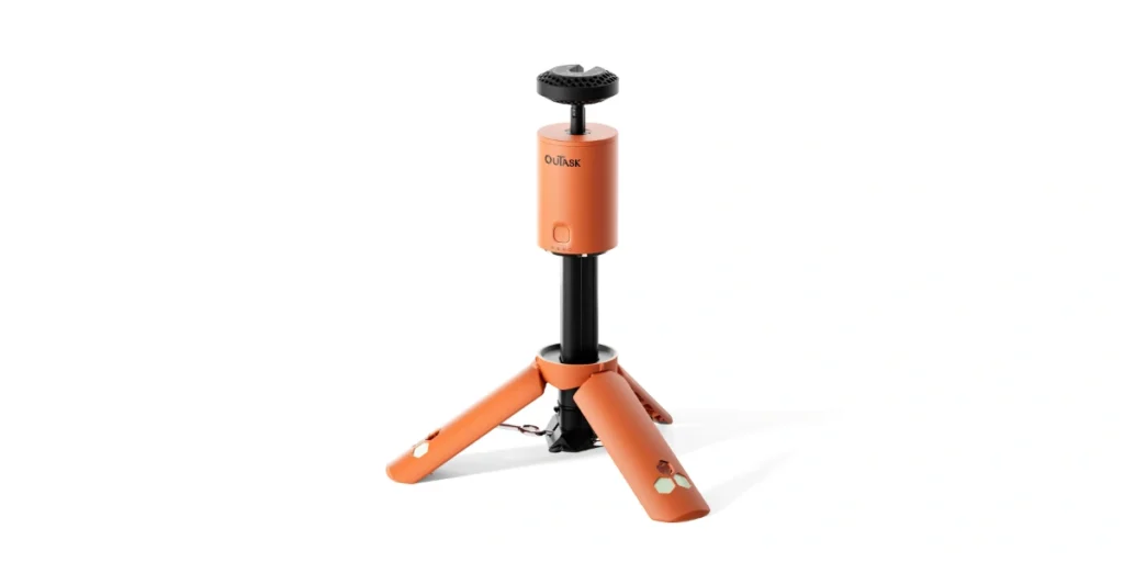 Orange ouTask TD1 camp light with its telescoping pole partly extended, standing on its fold-out tripod legs